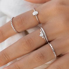 This silver twist ring features a unique textured band. It's the perfect stacking ring for your everyday jewelry collection!

These rings are also available in 14k solid gold and diamond.
 Size: 5, 6, 7, 8, 9 Silver Rings Combination, Silver Jewelry Diamond, Delicate Silver Jewelry, Stacked Silver Rings, Silver Stack Jewelry, Stacked Jewelry Silver, Stacked Rings Silver, Silver Jewelry Outfit, Ring Inspo Jewelry Silver