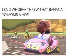 an older man driving a toy car in mario kart