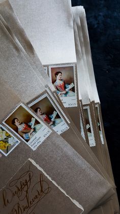 some mail envelopes with stamps on them