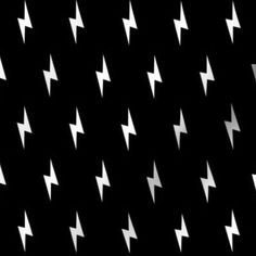 an abstract black and white background with many small white stars in the shape of arrows