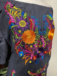 "Beautiful Floral Embroidered Dress - Handmade Embroidered Mexican Dress - Artisan Made Dress Beautiful hand embroidered dress! This has been made and brought directly from Puebla, Mexico. The dress has extremely detailed embroidery. The embroidery is 100% handcrafted. All the work on this dress has a professional skilled finish and the multicolor embroidered makes it look even more eye catching. The embroidery work is made with great quality thread. The eye catching will be on the embroidered w Traditional Multicolor Embroidered Cotton Dress, Folk Style Embroidered Dress With Multicolor Embroidery, Traditional Multicolor Embroidered Dress For Spring, Spring Embroidered Dress With Multicolor Machine Embroidery, Traditional Cotton Dresses With Tonal Embroidery, Folk Multicolor Embroidered Dress For Fiesta, Traditional Embroidered Dress With Geometric Patterns For Festivals, Multicolor Embroidered Dress With Resham Embroidery For Festival, Multicolor Embroidered Dress With Resham For Festival