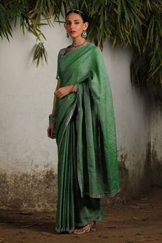 Green handwoven cotton zari saree with hand embroidered silver border. Comes with matching hand embroidered blouse and under skirt petticoat. - Aza Fashions Hand Embroidered Blouse, Zari Saree, Under Skirt, Border Saree, Green Saree, Saree With Blouse, Floral Border, Embroidered Blouse, Sarees Online