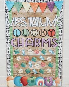 a bulletin board with lots of magnets on it and the words, mrs taum's lucky charms