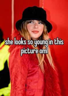 a woman wearing a red coat and black hat with the words she looks so young in this picture omi