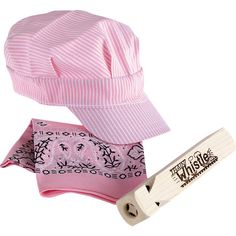 a pink and white striped hat next to a wooden skateboard on a white background