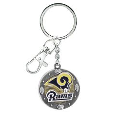 a key chain that has the rams logo on it and is attached to a metal ring