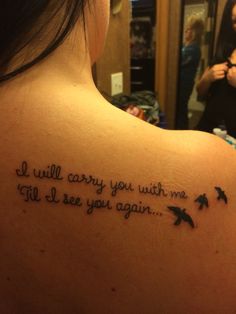 a woman with a tattoo saying i will carry you with me if i see you again