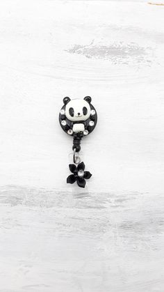 This  retractable Panda Bear badge holder would make a perfect gift for hospital staffs, doctors, students, teachers, child care providers, office workers, and anyone who adorns keys, identification, or swipe cards. This Retractable ID badge holder is great in holding your work ID, school ID. Great in holding small accessories such as scissors, locker keys etc. This super cute Panda Bear badge , the retractable cord extends approximately 32 inches.  Material is made of Resin.    No returns or ex Black Retractable Badge Holders As Gift, Black Retractable Badge Reel For Gift, Nursing Badge Reel, Nursing Badge, Swipe Card, School Id, Nurse Badge Holders, Retractable Id Badge Holder, Nurse Badge Reel