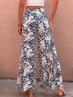 Unleash your inner fashionista with our Cancun Printed Wide Leg Belted Pant! Perfect for a day at the beach or a night out, these pants feature a fun print and a belted waist for a flattering fit. Say goodbye to boring pants and hello to style and comfort! Size Guide: Model is 5’6” tall, and has a 32.2” bust, 24.1”waist, & 35.6” hips. She is wearing a S / US 4 / AU 8. This pants is true to size. Material: 100% Rayon Feature: High rise. Belted Tie. Wide leg. Floral Printed. Back zipper closure. Relax Fit. Not lined. Care Instructions: Machine wash / Cold hand wash Cheap Wide Leg Bottoms With Floral Print, Trendy Boots, Leg Belt, Belted Pants, Day At The Beach, Daily Dress, Dress Jewelry, Comfortable Fashion, Floral Printed