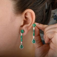 Natural Princess Cut Zambian Emerald Diamond Dangle Earrings Solid 18K White Gold Certified Baguette Emerald Earrings For Bride ≫ Features * Items Code: SGE01326-35101 * Diamond: 100% Genuine Diamond * Diamond Wt: 1.026 Ct. * Diamond Color: G-H * Diamond Clarity: S2-SI1 * Diamonds Cut: Brilliant Cut (Excellent Cut) * Metal: 18K Solid Gold (14K also available - Additional fees may apply) * Emerald Weight: 6.59 Ct.  * More options in gold color: Rose gold, yellow gold, White gold * Earrings Size: Formal Baguette Cubic Zirconia Earrings, Fine Jewelry Baguette Earrings For Formal Occasions, Elegant Princess Cut Emerald Jewelry, Elegant Green Emerald Cut Diamond Earrings, Princess Cut Emerald Jewelry, Emerald Green Diamond Earrings With Accents, Lightweight Jewellery, Elegant Green Emerald-cut Diamond Earrings, Earrings For Bride