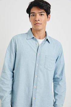 Look and feel amazing in this super soft, vintage inspired denim chambray shirt. Made from lightweight cotton chambray, this long sleeve collared button-down shirt features a vintage wash finish, classic fit, and patch pocket at chest.True to size100% CottonMachine Wash Cold. Tumble Dry Low. Remove Promptly. Do Not Bleach. Denim T Shirt, Denim Sweater, Chambray Shirt, Short Shirts, Denim Pant, Shirt Accessories, Denim Shop, Denim Shirt, Denim Fashion