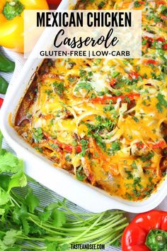 mexican chicken casserole in a white dish with red peppers and cilantro