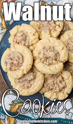 a plate full of cookies with the words walnut cookies on top and below it