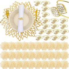 a set of gold tableware and napkins on a white background with place settings