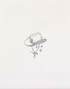 a drawing of a cowboy hat on a white paper with the words, i love you