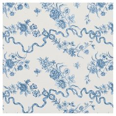 a blue and white wallpaper with flowers on it