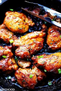 chicken wings with herbs and seasoning in a skillet