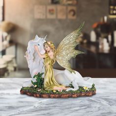 This gorgeous Fairy Figurine is perfect for creating a warm and cozy atmosphere. This Fairy figurine will add a splash of color to your home. You will fall in love instantly with this stunning figurine. Snow Balls, Pink Wings, Rose Fairy, Sky Pink, Pink Fairy, Fantasy Decor, Unicorn Horse, White Unicorn, Blue Fairy