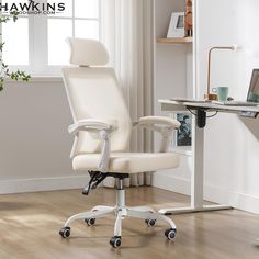 a white office chair sitting on top of a hard wood floor next to a window