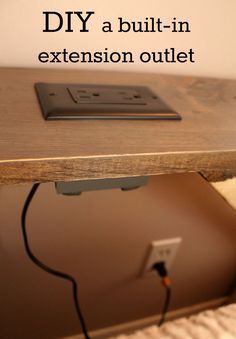 an electronic device is plugged in to a wall outlet with the words diy a built - in extension outlet