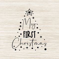 a wooden background with the words merry christmas written in black and white ink on it