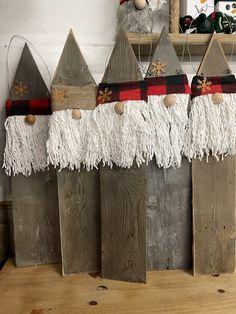 a group of wooden boards sitting on top of a table next to a stuffed animal