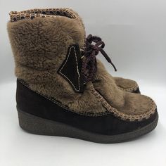 Vintage Snowland Women's Faux Fur Boots Leather Size 6 Wedge Rubber Heel Lace Up. Boots are vintage pre-owned. Please see all photos for visible condition. No original box. Leather upper plus faux fur. Balance man made. 962008. 56926. Brown. Heel approximately 1.75 inches. Left boot trim on right side appears to be detached for a couple inches - see photo - it is still intact after this area which keep integrity ok - previous owner may have tried to glue it. It doesn't appear to affect it becaus Faux Fur Boots, Cute Boots, Boots Leather, Fur Boots, Rubber Heels, Boot Shoes Women, Leather Boots, Womens Boots, Faux Fur