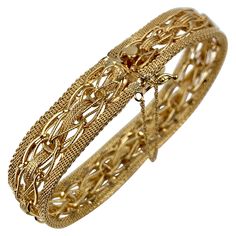 Solid 14 karat yellow gold mesh bracelet with heart shaped thumb catch plus a figure eight catch and safety chain on the side for safety. The mesh is quite interesting and partially hand woven. The bracelet is clearly marked 14k on the back of the catch (see photo). Length-8.5" Diameter-2.75" Height-.5" Professionally cleaned and polished. (Like brand new) 31.6 grams Bracelet With Heart, Solid Gold Bracelet, Lace Bracelet, Gold Link Bracelet, Yellow Gold Bangle, Hoop Earrings Style, The Catch, Bracelets Gold Diamond, Mesh Bracelet