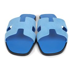 This pair of Oran sandals are in Bleu Cameo suede goatskin, with the iconic H cutout detail, Bleu Cameo leather goatskin insole, and natural leather soleOrigin: ItalyCondition: New and never wornAccompanied by: Hermes box, dustbags, ribbonSize: 40.5 EU Luxury Blue Leather Mules, Luxury Suede Mules For Summer, Designer Suede Sandals With Leather Sole, Blue Sandals With Flat Leather Sole, Blue Flat Heel Sandals With Leather Sole, Blue Sandals With Leather Sole And Flat Heel, Designer Blue Slides For Summer, Blue Suede Sandals With Leather Footbed, Luxury Blue Slides For Summer