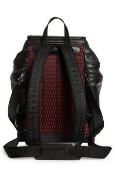 Logo-jacquard webbing defines this scaled-down calfskin backpack designed with a Louboutin-red lining and reinforced with a sturdy, boldly branded base. Light padding at the straps and mesh back ensure comfortable carrying—or attach the webbed crossbody strap for additional carrying options. Magnetic-snap flap with drawstring closure Top carry handle; adjustable backpack straps; removable, adjustable crossbody strap Exterior zip pockets Interior wall and zip pockets Mesh-padded back Cotton linin Luxury Leather Backpack With Textured Finish, Luxury Coated Canvas Leather Backpack, Luxury Leather Trim Standard Backpack, Luxury Textured Leather Backpack, Designer Leather Backpack With Leather Trim, Designer Backpack With Leather Backing, Luxury Black Backpack With Detachable Strap, Designer Backpack With Leather Trim, Black Textured Leather Backpack