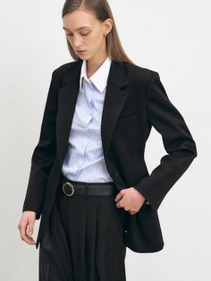 This is HACIE’s tailored jacket features a subtle diagonal twill texture in an hourglass silhouette. Crafted from a luxurious wool blend fabric, it is adorned with faux pockets and flap pockets for added detail. Overall, it boasts a sophisticated and feminine silhouette with a natural sense of dimension that stands out in body coverage.- It's perfect for daily wear- It can be paired with different styles of innerwear to create various looks- It features front buttons for easy removal Timeless Notch Lapel Outerwear For Office, Timeless Winter Office Blazer, Sleek Tailored Outerwear With Pockets, Outerwear With Pressed Crease And Suit Collar For Office, Timeless Single Button Office Outerwear, Timeless Office Outerwear With Single Button, Sleek Outerwear With Pressed Crease For Work, Sleek Outerwear With Pressed Crease For Office, Sleek Semi-formal Outerwear With Lapel Collar