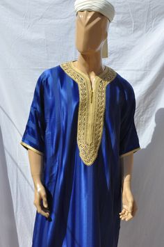 Kaftan For Men Beautiful moroccan kaftan for men gift Beautiful moroccan kaftan in cotton for men. This moroccan clothing is handmade in soft fabric cotton. This kaftan is very pleasant to wear mainly in summer, at the beach, after a spa, indoor, outdoor, at a party... Very fast to wear, not stick to the skin, this kaftan is a really must have clothing. - Cotton - embroidery - One size - Machine washing return policy I check myself each product and sell only the best quality products in any case Traditional Short Sleeve Kaftan For Festive Occasions, Blue Kaftan For Eid, Blue Kaftan For Eid And Traditional Ceremonies, Traditional Short Sleeve Kaftan For Ceremonies, Traditional Blue Thobe For Eid, Traditional Short Sleeve Kaftan, Traditional Tunic Kaftan For Diwali, Eid Traditional Tunic Kurta, Eid Tunic Kurta For Traditional Ceremonies