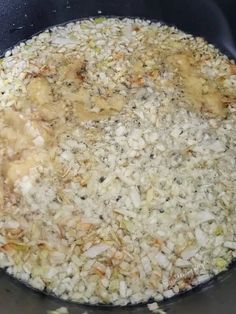 the food is being cooked in the pot on the stove top, ready to be eaten