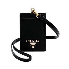 This Stylish Prada Badge Holder Is Perfect For Everyday Use. Whether You're A Working Woman Or A Student, With This Badge Holder, You'll Always Be Close To Your Necessary Id. The Swivel Hardware Combined With The Prada Logo Featured Prominently On The Beige Leather Back Allows For Discrete Concealment Of Any Personal Information. This Badge Holder Functions With Or Without The Lanyard. Model: 1mc007 Black Vitello Move Textured Leather Gold-Tone Hardware Swivel Hardware Metal Prada Logo One Card Luxury Black Card Holder For Travel, Elegant Black Card Holder With Logo Plaque, Black Prada Bag, Cardholder Wallet, Prada Tote Bag, Prada Shoulder Bag, Prada Logo, Mini Camera, Prada Leather