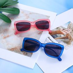 This eye-catching frame has two bold colors, blue and pink, paired with grey lenses, surely making a splash on your daily look. Whether on the beach, on street, or on a drive, these sunglasses guarantee you a cool and comfortable experience. Fashionable and wearable, the style will endow you with extra charm.Frame Shape: RectangleFrame Color: BlueFrame Material: PlasticLens Color: GreyLens Material: Lens Width: 53 mmBridge Width: 17 mmTemple Length: 140 mmUV Protection: UV400Polarized: No Trendy Rectangular Cat Eye Sunglasses For Summer, Multicolor Rectangular Sunglasses With Tinted Lenses, Trendy Gradient Sunglasses For Beach Season, Modern Pink Cat Eye Sunglasses For Beach, Multicolor Rectangular Tinted Sunglasses, Beach Cat Eye Sunglasses With Anti-reflective Square Frame, Modern Plastic Cat Eye Sunglasses For The Beach, Summer Cat Eye Sunglasses With Tinted Lenses For Beach, Summer Beach Cat Eye Sunglasses With Tinted Lenses