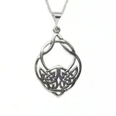 This Celtic Wolf necklace is designed in solid Sterling Silver and comes on your choice of a 16" or 18"  sterling chain. The pendant measures 43mm or 1.75".~The Celtic Wolf is a tribal design. "If you look at the design head on, you will see the face of a wolf created with Celtic Infinity knots. If you split the design down the middle with your eyes, you will also notice two wolves baying up at each other in the lower center of the design."©~The wolf symbolizes loyalty and protection.All pendant Viking Style Sterling Silver Necklace Gift, Viking Style Sterling Silver Nickel-free Necklace, Nickel-free Viking Style Sterling Silver Necklace, Nickel-free Sterling Silver Viking Necklace, Silver Wolf Design Symbolic Jewelry, Silver Symbolic Wolf Design Jewelry, Symbolic Silver Wolf Design Jewelry, Viking Style Wolf Design Jewelry Gift, Viking Style Silver Wolf Design Jewelry