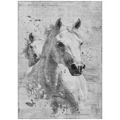 black and white photo of two horses running in the wind with splashing paint on it