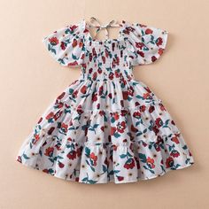 Girls Summer Red Floral Short Sleeve Casual Dress Playful Summer Floral Dress, Playful Floral Print Summer Dress, Cute Floral Dress For Summer Vacation, Spring Floral Print Sundress For Playdate, Spring Floral Sundress For Playdate, Playful Floral Print Sundress For Summer, Playful Floral Sundress For Summer, Playful Summer Floral Dress With Ruffles, Cute Short Sleeve Sundress For Summer