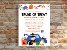 a trick or treat poster on a brick wall with pumpkins, ghostes and cats