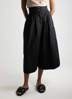 This style features:    - high waist cinched-in fit  - double front buttons  - zip fly  - side pockets  - two deep lower pockets  - front pleating  - wide legs and a slightly cropped hem length depending on height  - fabric content: 100% cotton    - machine wash cold  - hang dry    style tip: the goes-with-everything pants. made of heavyweight cotton these pants are durable comfortable and go with just about everything. dress them up with the matching blazer or keep it casual with your favorite Solid Cotton Bottoms With Pleated Waist, Utility Style Shorts With Welt Pockets, Relaxed Fit Bottoms With Pleated Waist And Wide Leg, Relaxed Fit Wide Leg Bottoms With Pleated Waist, Relaxed Fit Bottoms With Pleated Waist For Daywear, Casual High Waist Bottoms With Pleated Waist, Wide Leg Bottoms With Pockets For Daywear, Casual High-waisted Bottoms With Pleated Waist, Utility Cropped Leg Bottoms With Side Pockets