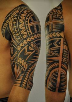 two men with black and grey tattoos on their arms, both showing the same pattern