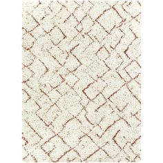 an orange and white area rug on a white background with small squares in the middle