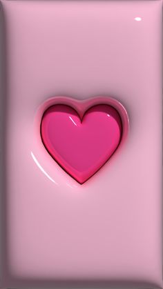 a pink heart shaped object in the middle of a square frame