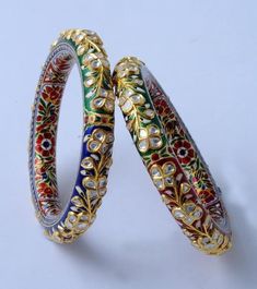 Traditional Handmade Bangle For Celebrations, Artistic Multicolor Jewelry For Festivals, Artistic Multicolor Festival Jewelry, Round Meenakari Bangle As Gift, Traditional Handmade Bracelets For Celebrations, Traditional Multicolor Hand Painted Jewelry, Traditional Hand Painted Multicolor Jewelry, Multicolor Motif Bangle Bracelets, Multicolor Bangle Bracelets With Motifs