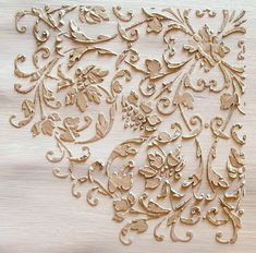 an intricately designed piece of wood on a table