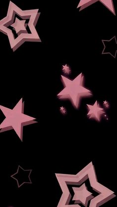 pink and black stars are flying in the air