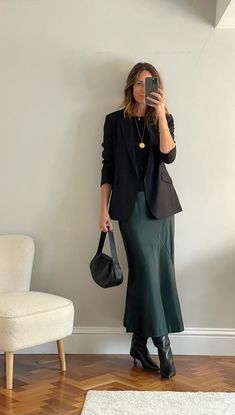 This satin slip skirt is a longer length than the usual ones that I stock. It is perfect for taller ladies. Or good as a maxi skirt length, The model in this picture is @mytall40s (instagram page for tall fashion) Abby is 6"1 so you can see it is a great length for taller ladies. Length measured on a size 12 is 105cm 65% polyester 35% viscose 30 degree wash, do not tumble dry Formal Long Skirt Outfit, Long Skirt Business Casual, Navy Slip Skirt Outfit, Satin Skirt Winter Outfit, Slip Skirt Outfit Winter, Business Casual Skirt Outfits, Satin Slip Skirt Outfit, Green Satin Skirt Outfit, Satin Midi Skirt Outfit