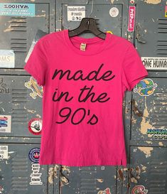 "Made in the 90's hot pink t-shirt  Size medium, but runs small and is more like a small 100% Cotton There is one hardly noticeable discoloration on the top right of the shirt which is shown in the last picture. You can barely see it though. Measurements Armpit to armpit 15\" (\" total) Total length of shirt 22\" Items are shipped out within 1-2 business days. If you have any questions please feel free to message me I reply quickly. Thank you for looking and happy shopping!" 90s Baby, Music Tees, Pink Tshirt, Graphic Tees Women, Baby Tshirts, Pullover Sweaters, Happy Shopping, Womens Clothing Tops, Hot Pink