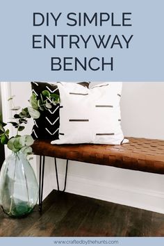 a bench with some pillows on it and the words diy simple entryway bench