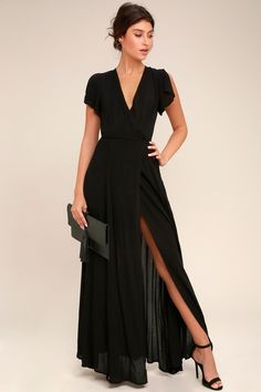 Win them over with the Heart of Marigold Black Wrap Maxi Dress! Black maxi dress with a surplice bodice, short sleeves, and a wrap skirt. Petite Black Long Dress, Black Attire Wedding Guest For Short People, Classy Formal Dresses Lulus, Black Dress For Outdoor Pictures, Date Night Dresses Classy Dressy, Coat For Semi Formal Dress, Black Wedding Guest Dress Mid Size, Classy Bridesmaid Dresses Lulus, Black Wedding Dress Lulus